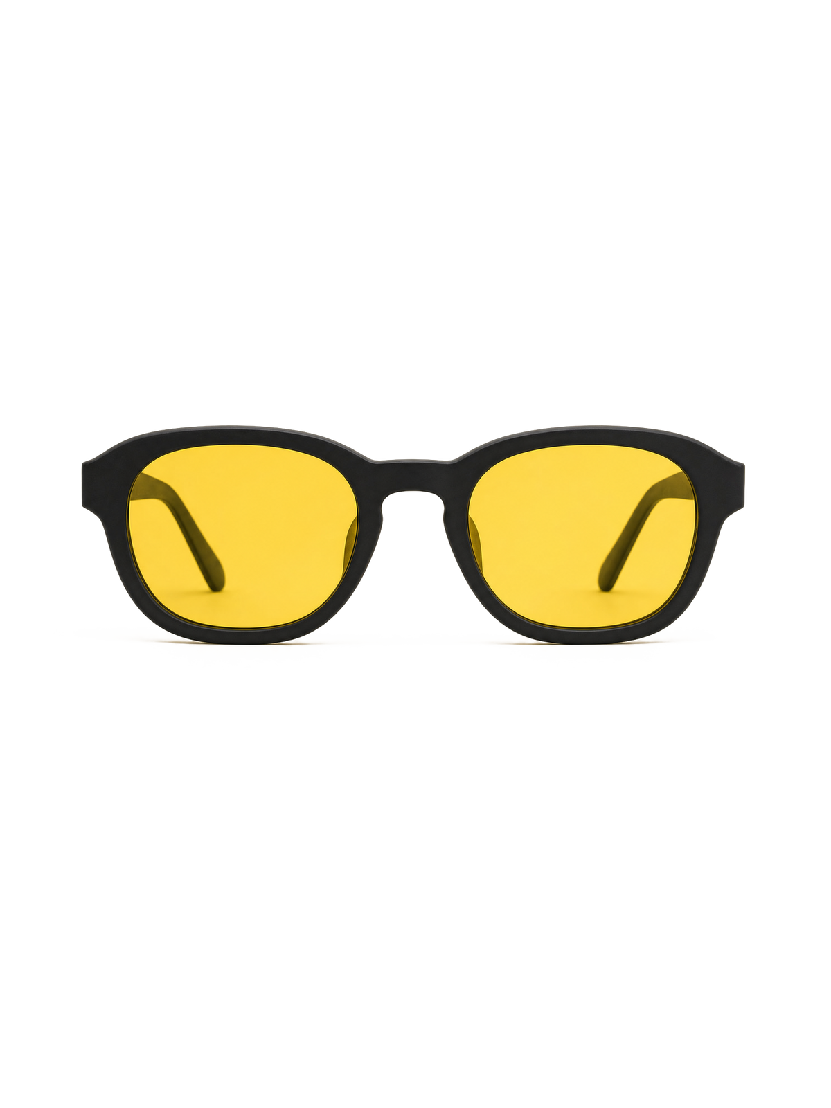 Transparent-background cutout of an ATÉN matte black frame with pronounced amber Focus Mode lenses in a straight-on front view; both temple tips are visible through the lenses, with a faint pale shadow beneath the lower rims.